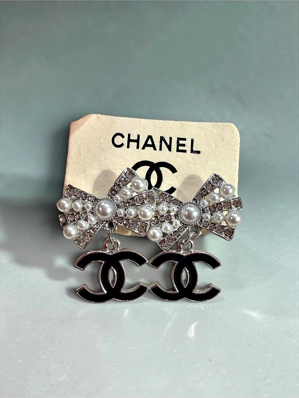 Pearl Bow Logo Drop Earrings Black & Silver | New